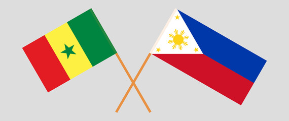 Crossed flags of Senegal and the Philippines. Official colors. Correct proportion