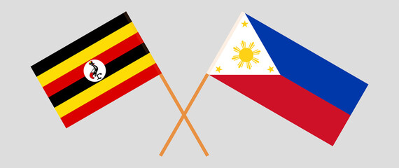 Crossed flags of Uganda and the Philippines. Official colors. Correct proportion