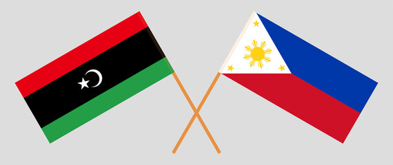 Crossed flags of Libya and the Philippines. Official colors. Correct proportion