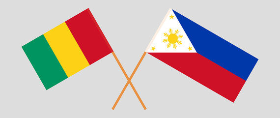 Crossed flags of Guinea and the Philippines. Official colors. Correct proportion