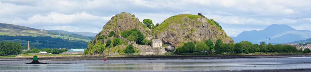 Dumbarton castle building on volcanic rock aerial view from above Scotland