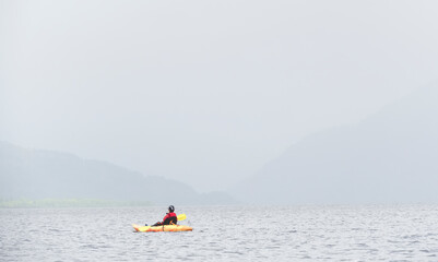Yellow kayak on open water at Loch Lomond