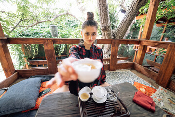 Tea ceremony is performed by tea master in kimono
