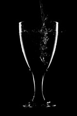 glass of water on black