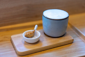 cup of coffee with milk and bread