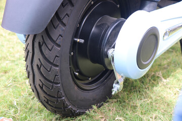 Electric scooter rear wheel with hub dc motor and breaks. Future clean transport vehicles advancement concept