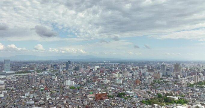 空撮 - 新潟県新潟市中心部の街並 ビル街 ドリー左から右 観光素材 ビジネス素材