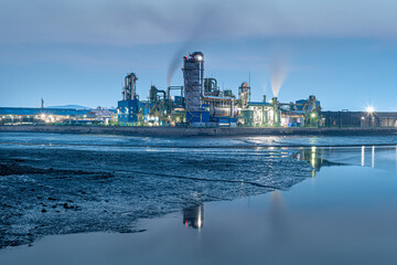 Port and factory after sunset
