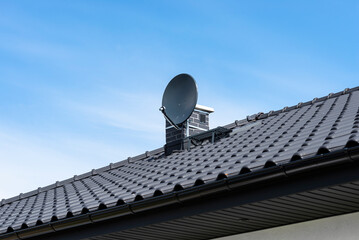 Graphite satellite dish mounted to the chimney with the chimney holder.