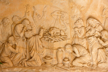 Fototapeta na wymiar Sculpture depicting the priests of Baal at El Muhraqa