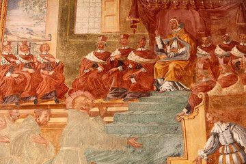 Basilica di Santa Caterina, Galatina, Apulia.Fresco in the cloister : St Francis at the feet of the...