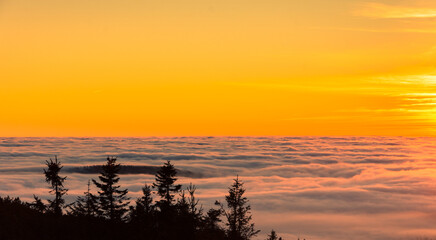 sunset in the mountains during inversion