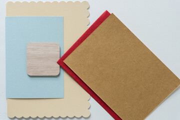 wood square object and paper cards