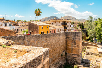 Obraz premium Walls of the Porta del Moll fortress in the old town of Alcudia, Mallorca island