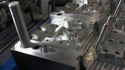 Large steel machine mechanism on the plant. Surface of some large factory machine.
