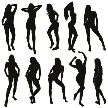 Collection of black vector silhouettes of standing women in different poses. 
Silhouettes of beautiful sexy girl on white background.