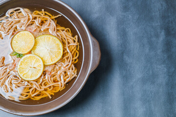 Korean food Naengmemilguksu, a winter delicacy, this buckwheat noodle dish is served in a cold chicken- or beef-based broth and topped with cold slices of beef and egg as a garnish.