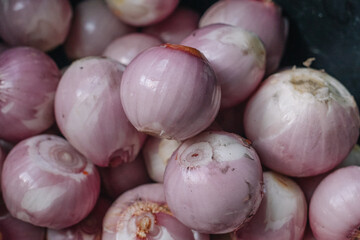 Shallots, peeled and ready to cook