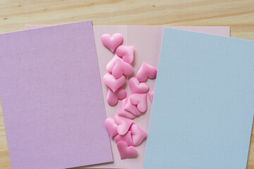 blank gift cards and hearts on  wooden table