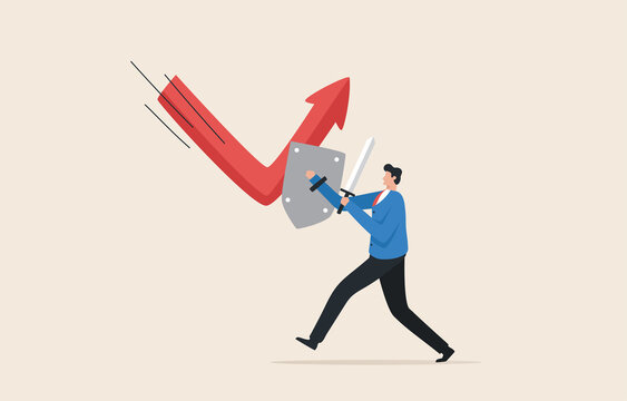 Business reversal from recession. Economic recovery. Stock market bounce back or reversal...Businessman holding a strong shield to recover the red arrow economic graph.