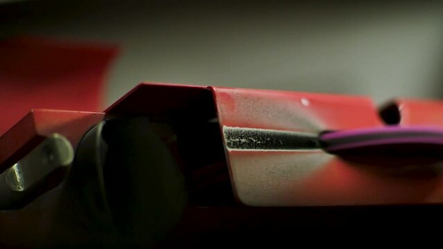 hockey skates. sharpening the blade of a shoe close-up. sport. hockey. blade sharpening sparks