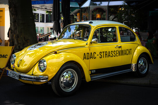BERLIN - JUNE 18, 2022: Economy car Volkswagen Beetle in ADAC (General German Automobile Club) colors. Classic Days Berlin.