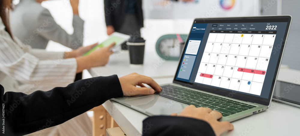 Poster calendar on computer software application for modish schedule planning for personal organizer and on