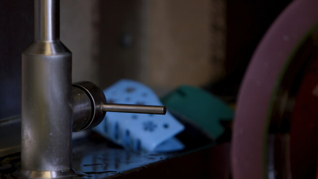 Hand Opening A Stainless Steel Water Faucet With No Water. Video. Close Up Of Female Hand Opening And Closing Broken Tap At The Kitchen At Home.