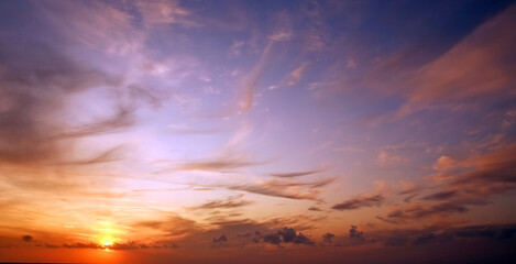 Naklejka na ściany i meble Dramatic and impressive sunset sky background, beauty in nature landscape