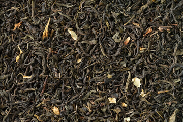 Dried Chinese Jasmine tea leaves close up full frame