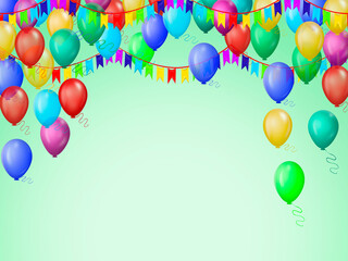 Multicolored festive balloons on a green background.