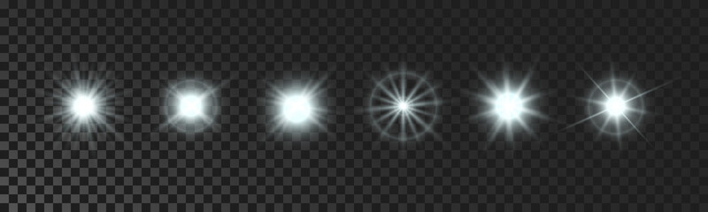 Set of white glowing sparkling stars
