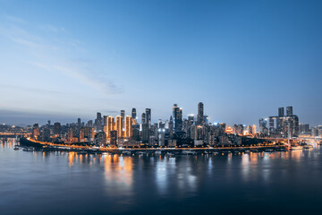 Fototapeta na wymiar High-angle night scenery of tall buildings along the Yangtze River in Chongqing, China