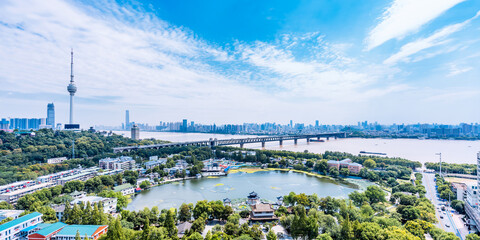 Sunny day scenery of Guishan TV Tower and Wuhan Yangtze River Bridge in Wuhan, Hubei, China