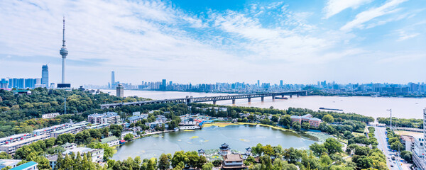 Sunny day scenery of Guishan TV Tower and Wuhan Yangtze River Bridge in Wuhan, Hubei, China