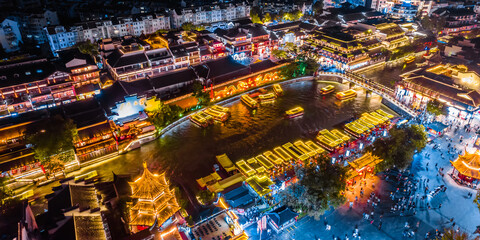 Aerial view of cruise ship at night on the Qinhuai River in Nanjing, Jiangsu, China