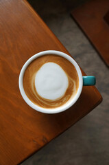 Top view White cup of Cappuccino Latte coffee isolated on white background with clipping path.
