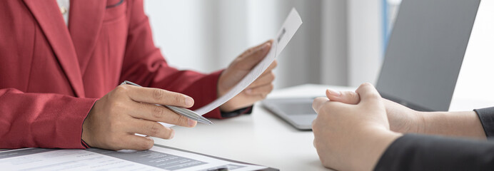 Employer or HR department is reading the resume and interviewing the ability of new employees, Employer is selecting job applicants, Employment and Recruitment Concept.
