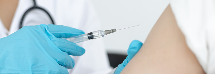 Vaccination, Doctor is vaccinating the patient with antibiotics or virus-resistant antibiotics to prevent the spread of the virus, Antibiotics prevent new strain of flu concept.