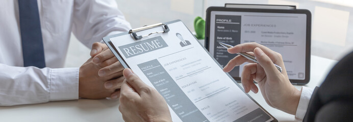 Employer or HR department is reading the resume and interviewing the ability of new employees,...