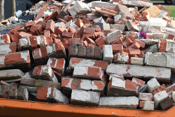 Bricks in a Garbage Dumpster