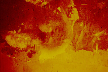 Yellow red grunge background. Painted rough concrete wall. Blood red background with space for...