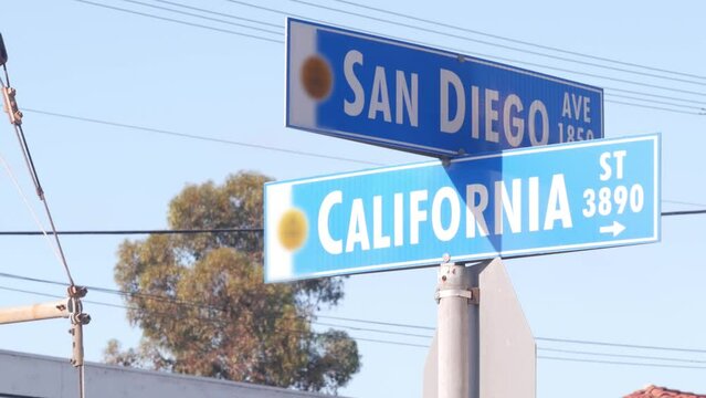 San Diego and California street crossroad sign, road intersection USA. Waterfront city near Los Angeles, beachfront travel destination for summer coastal vacations.