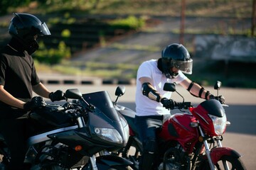 Moto school track driving. A biker on a motorcycle.
