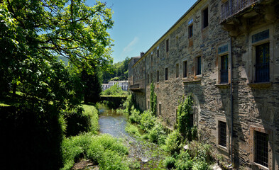 View of the landmark monastery of Samos alongside Sarria river in the Galicia region of Spain, right on Saint James way.