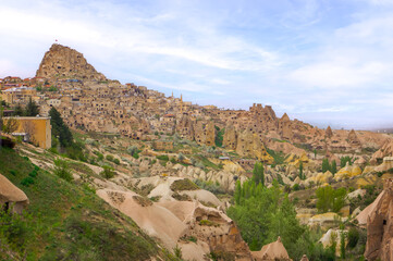 Side view of Uchisar Castle nad Pigeon Valley of Cappadocia, Nevsehir, Turkey.