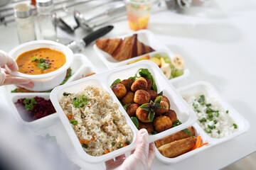 Lunch box, vegetable meatballs with rice, and vegetables. Box diet. Appetizing lunch boxes. Food...