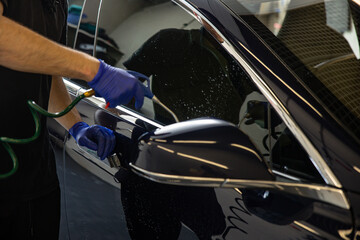 Automobile Wash Cleaness Hose. Carwash Service. Business Care. Garage Concept