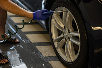 Fototapeta premium Automobile Wash Cleaness Hose. Carwash Service. Business Care. Garage Concept