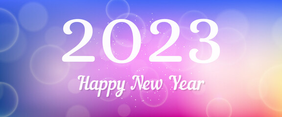 Happy new year 2023 incription on blurred background